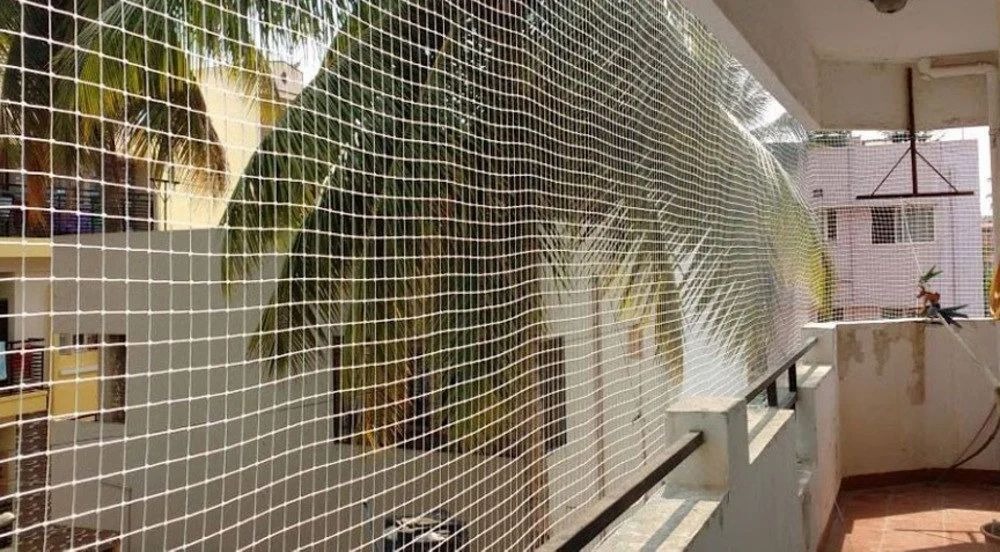 Bird netting installed on balcony